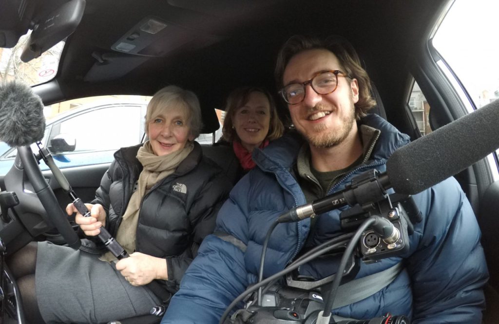Photograph of Ismar Badžić, Angie Mason and Alison Holt in a car with camera equipment filming for the Panorama Crisis in Care documentary.